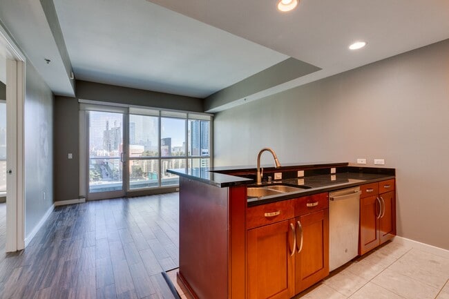Building Photo - Iconic Strip-View Luxury | Elegant 1BR + Den High-Rise Residence