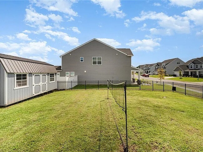 Building Photo - Earn Wealth While Leasing - Like a Homeown...