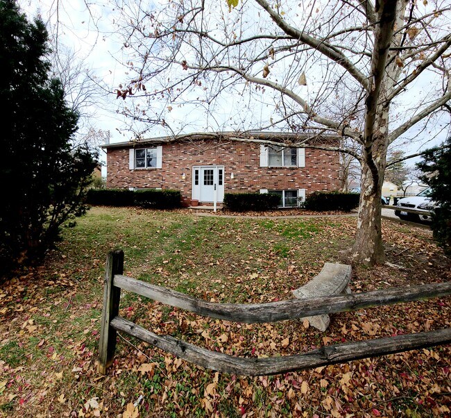 Front building with yard - 12 W Mill St