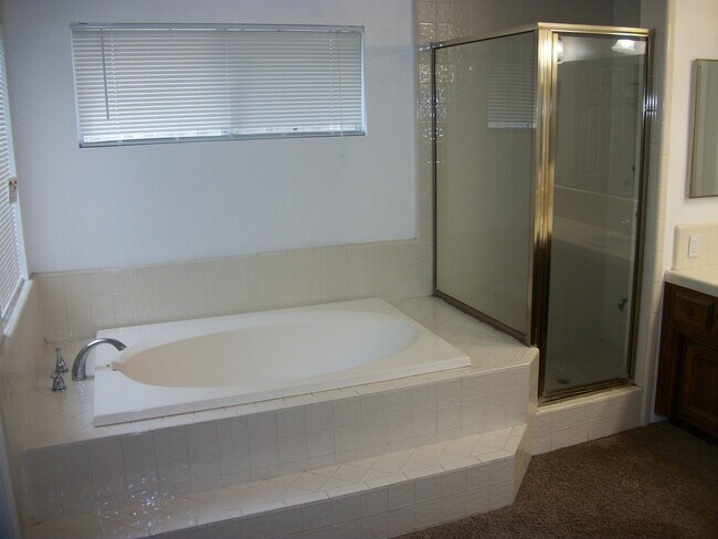 Building Photo - Coming Soon: Spacious Renovated 3 Bedroom Rosedale Home with Pool, Dual Fireplaces & Covered Patio