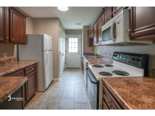 Building Photo - The Woodlands: 2BR 1 BA