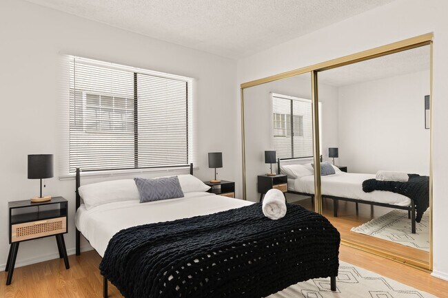 Building Photo - A fully furnished 3 bedroom, 2 bathroom ap...