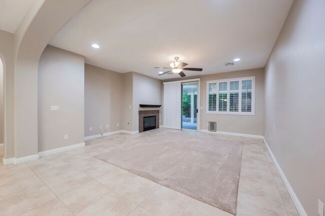 Building Photo - Single Story w/ duel primary suites gated ...