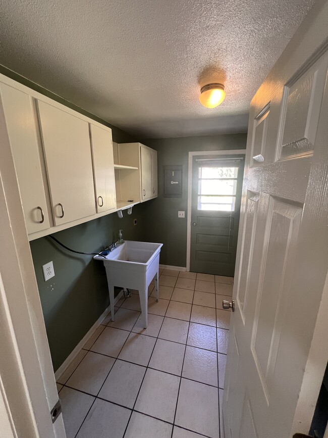 Laundry room with washer/dryer hookups. - 1298 Cedarcliff Dr