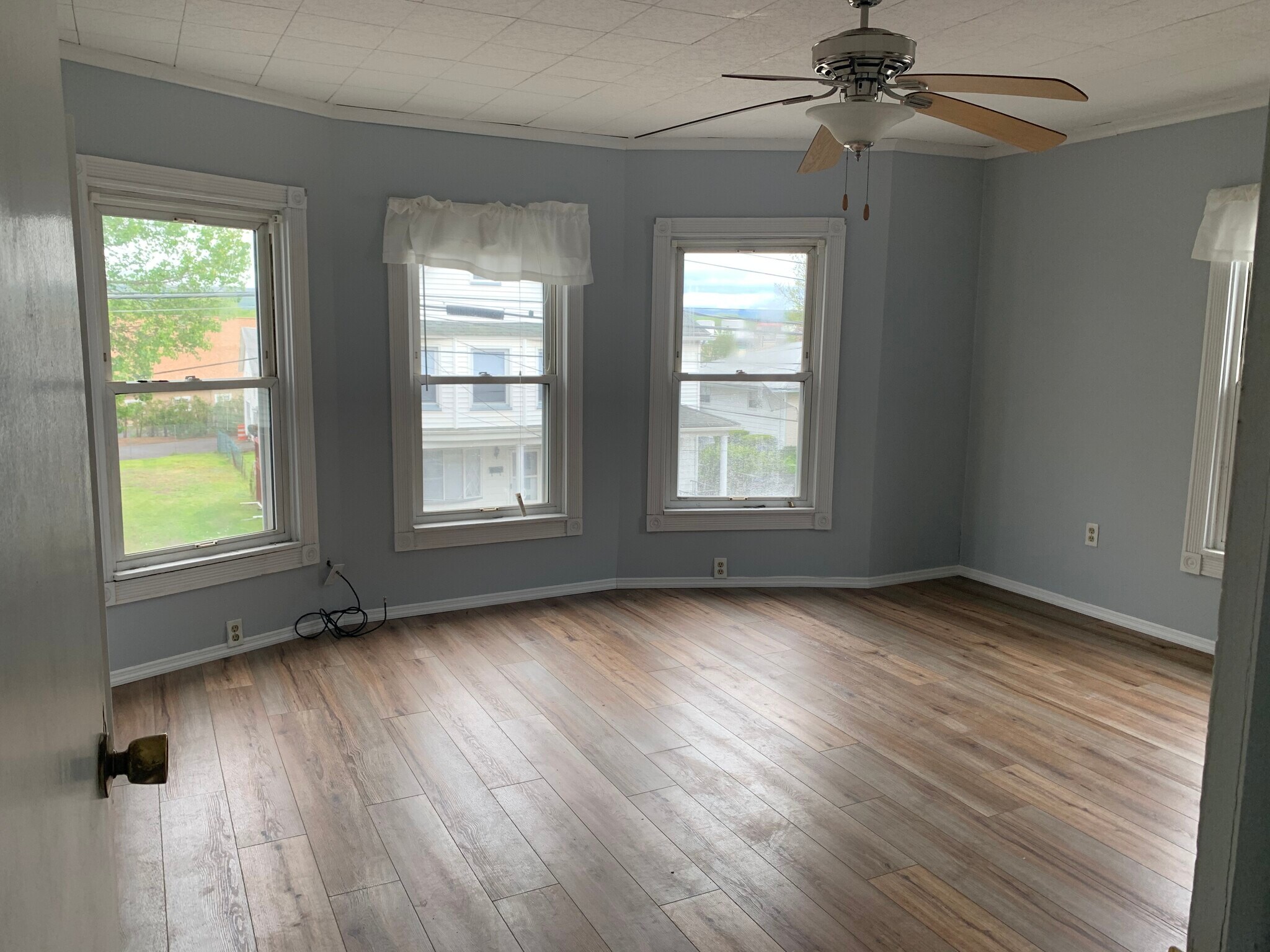 155 Bedroom 1 with ample natural lighting/Second Floor - 155 Main St