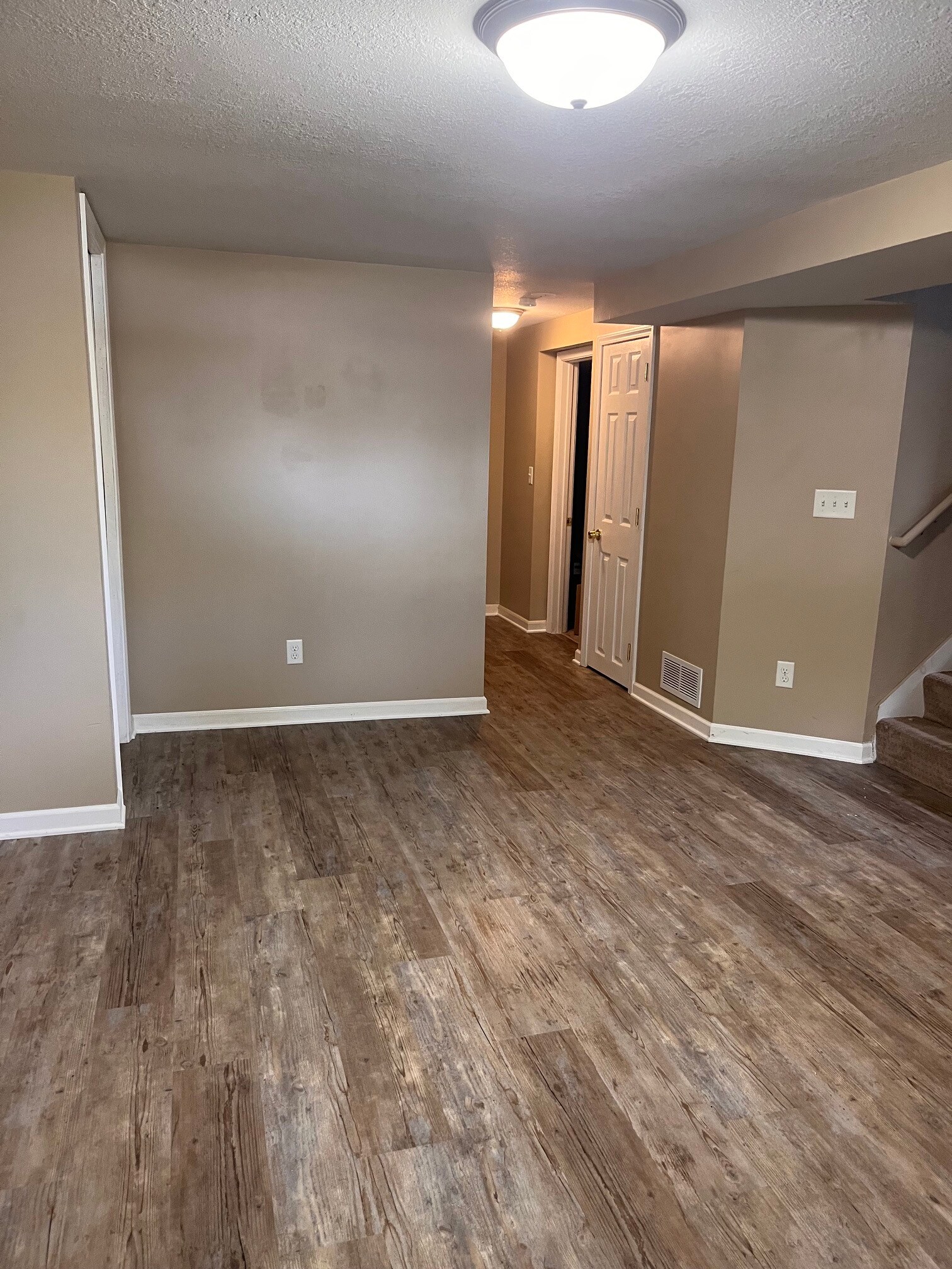 lower level family room looking to the bedroom - 6400 1st Ave S
