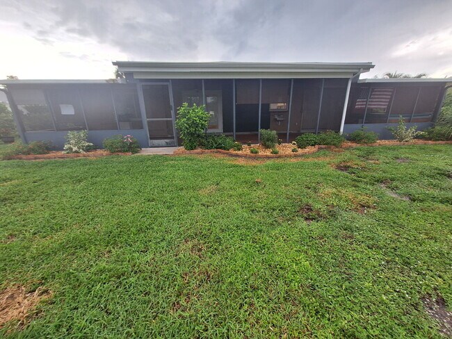 Building Photo - Gulf Access Home on Canal Available Now