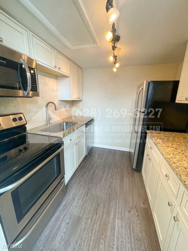 Building Photo - 1 br, 1 bath Condo - 3337 S Monaco Pkwy Un...