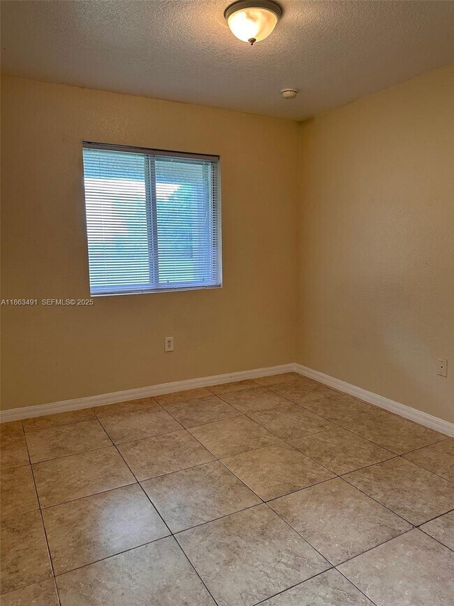 Building Photo - 1465 NW 59th St