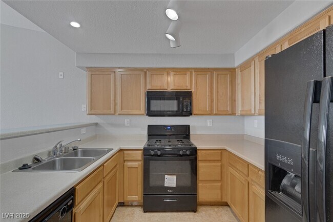 Building Photo - 8777 W Maule Ave