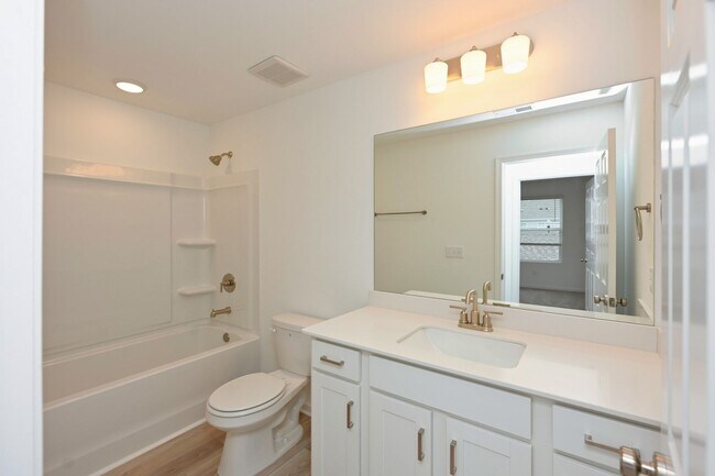 Building Photo - **BE THE LUCKY ONE TO LIVE IN THIS 2024-BUILT BRICK TOWNHOME IN THE VILLAS AT REGAL SQUARE FEATUR...