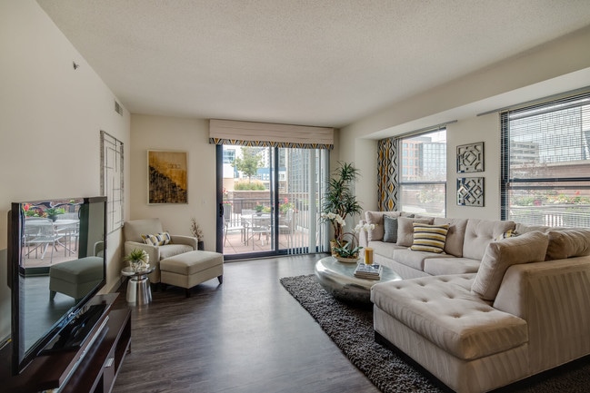 Enjoy seamless indoor outdoor living with breathtaking views and your own private patio balcony. - The Manhattan by Windsor