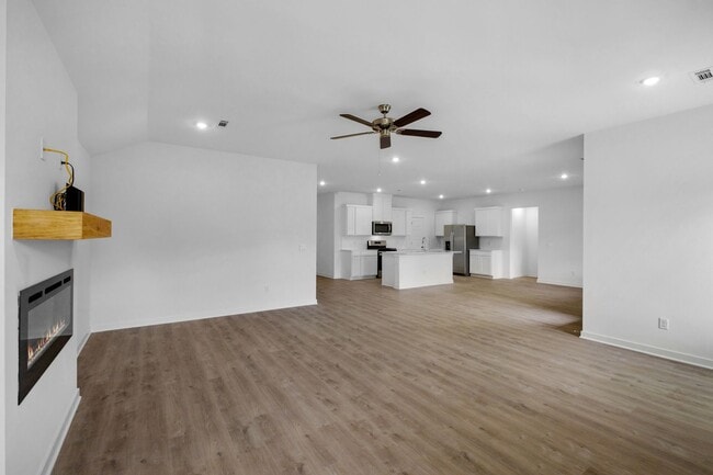 Building Photo - Stunning New 4-Bedroom Home with Modern Up...