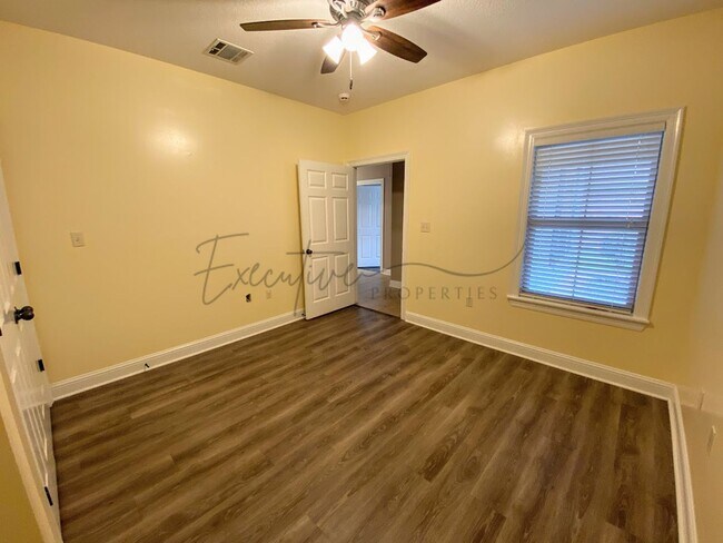 Building Photo - Family Home in Lafitte Landing – Fenced Ya...