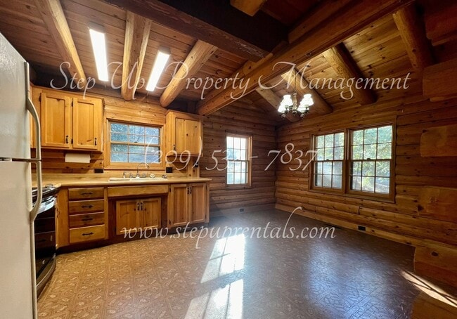 Building Photo - Rustic Retreat: Charming 1-Bedroom Log Cab...