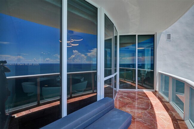 Building Photo - 18201 Collins Ave