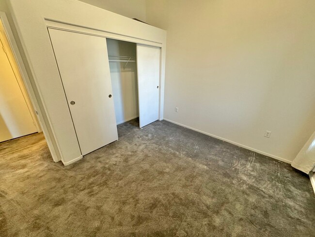 Building Photo - ADORABLE 2 BEDROOM 2 BATHROOM CONDO WITH A...