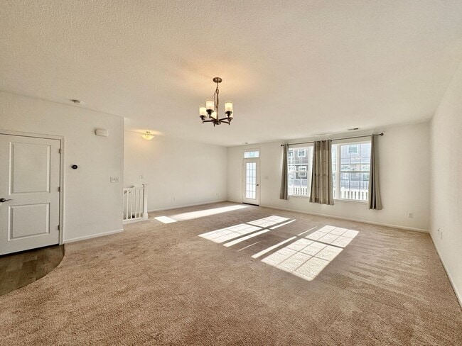 Building Photo - 3 Bedroom Townhome in Spence Crossing! Water/Sewer/Trash/Landscaping INCLUDED! - Attached Garage ...