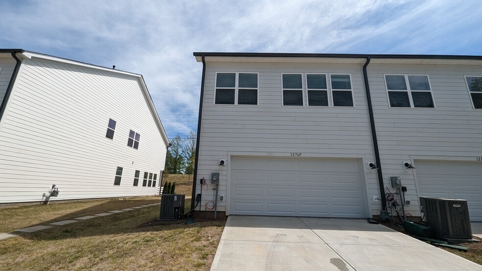 Rear view garage side with driveway - 1276 Brawley School Rd