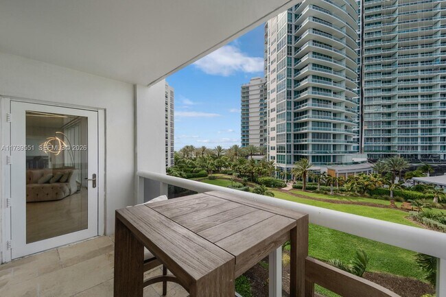 Building Photo - 10275 Collins Ave