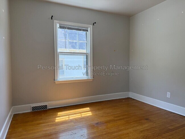 Building Photo - 704 8th St S