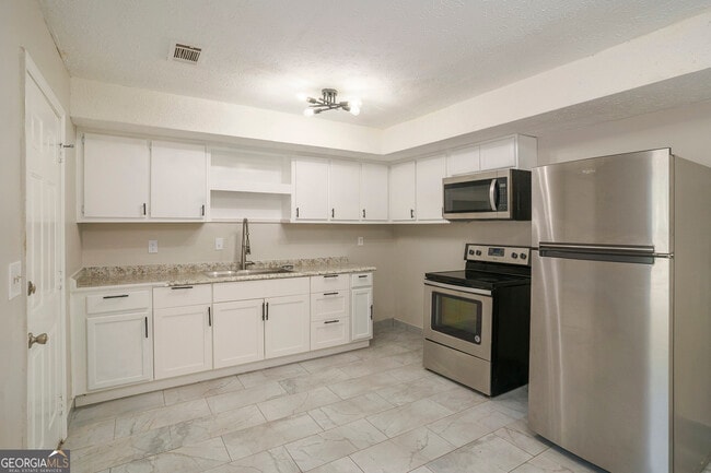 Building Photo - 9285 Cedar Ridge Dr NW