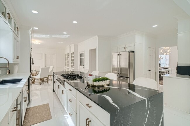 Building Photo - Furnished Estate Home - Double Curved Stairway - Marble Floors - Waterfall Island