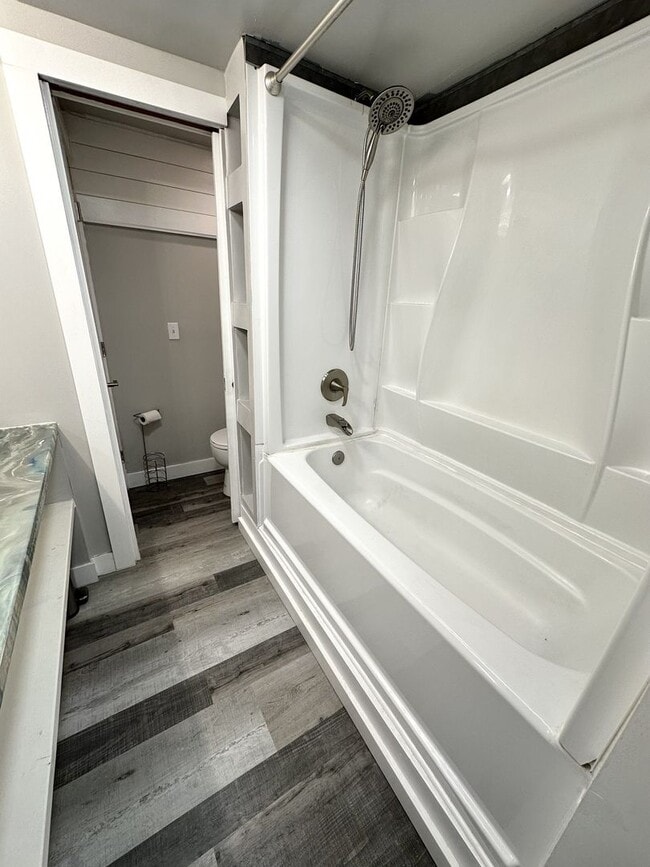 Building Photo - 1st Rent Month Free!! Stunning Partially F...
