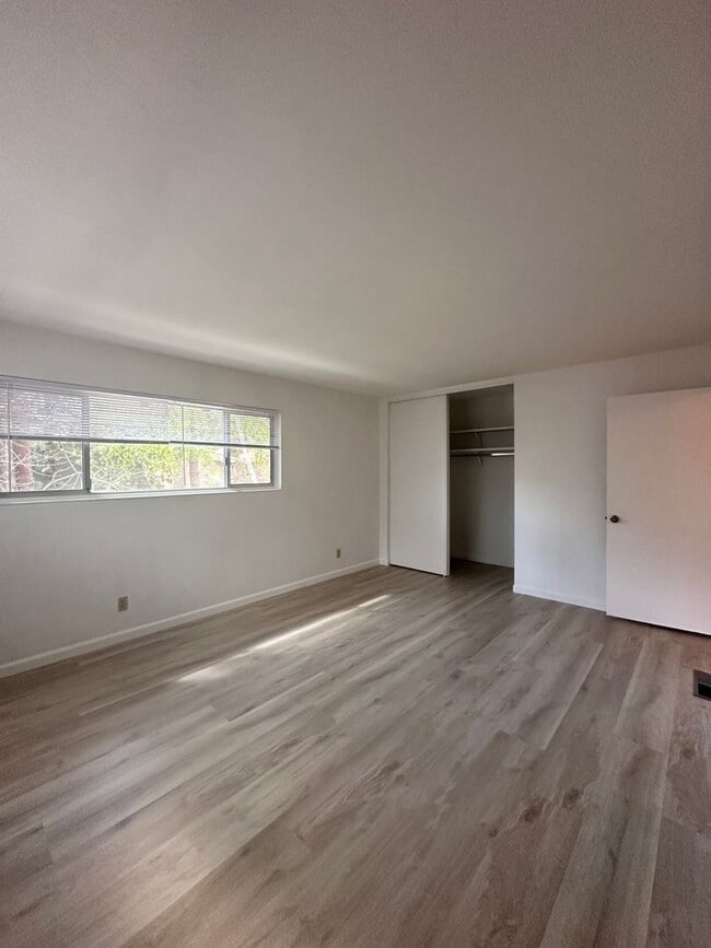 Building Photo - Unit with updated flooring!