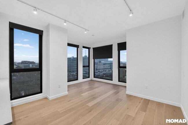 Building Photo - Act Fast: Luxury SoMa Corner Unit w/ EV Parking & Views