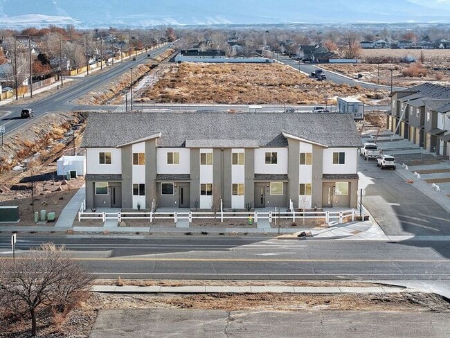 Building Photo - Brand-New 4-Bedroom Townhome in Orchard Mesa!