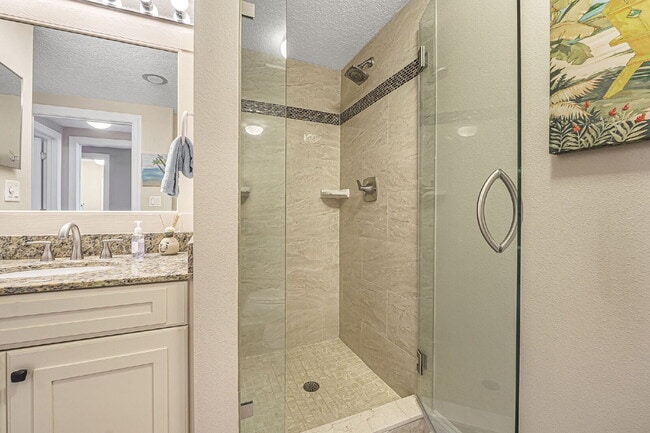 Building Photo - Available for a 7-12 month lease, Unit 208 has a beautiful oceanfront setting.