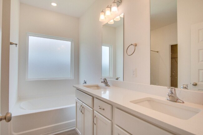Building Photo - 3BR/2BA Home Near Navy Federal Featuring Quartz Counters, 2-Car Garage & Internet Included