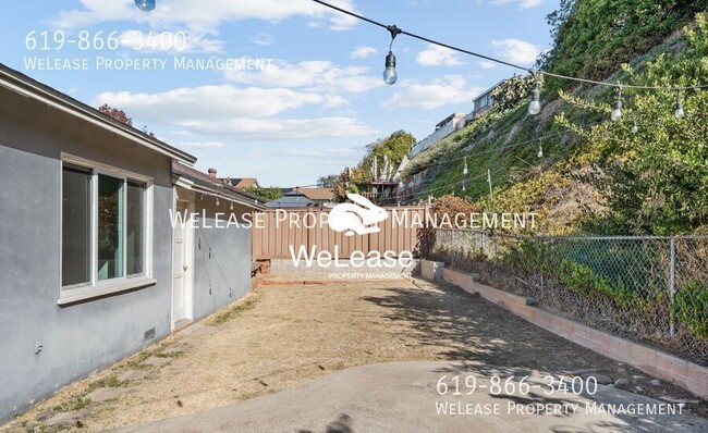 Building Photo - Charming 2 Bed 1 Bath Home with Backyard!