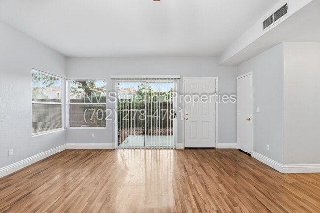 Building Photo - SW!!! 2 Bedroom Condo 1st Floor!! 2 Garage!! Gated!! Community Pool!! Fitness Room!! 2 Primary Be...