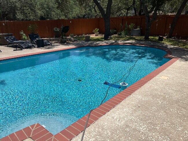 Building Photo - 4 Bedroom Oasis with Pool, Close to Milita...