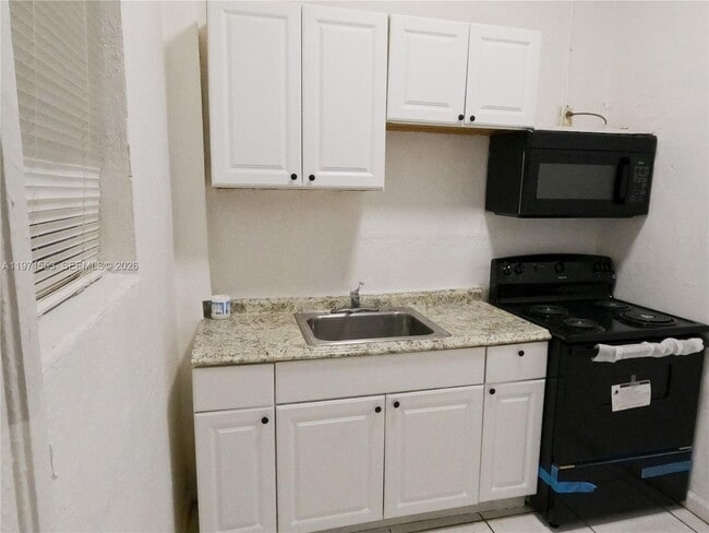 Building Photo - 1120 NW 64th St