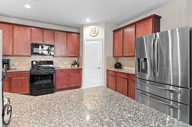 Building Photo - 8017 Bassano Dr