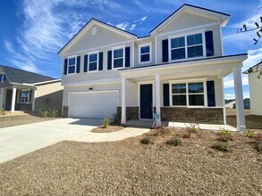Building Photo - Four Bedroom in The Lakes at New Riverside!
