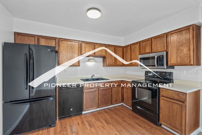 Building Photo - Spacious Split-Level Home in D20 with Mountain Views, 2 Car Garage, Fenced Yard and AC!