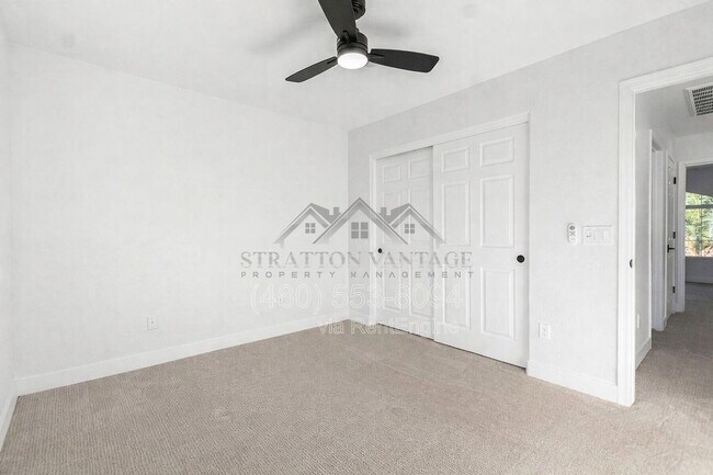 Building Photo - 1005 E Stirrup Ln