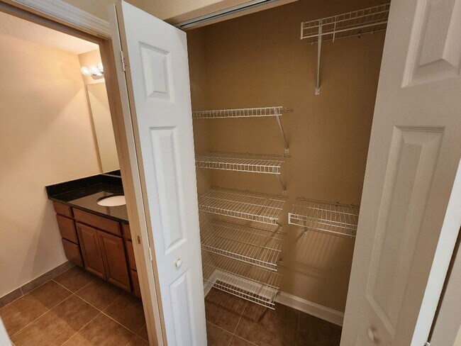 Building Photo - 50% off this beautiful 2/2 Bouchelle Condo with private garage, see details*