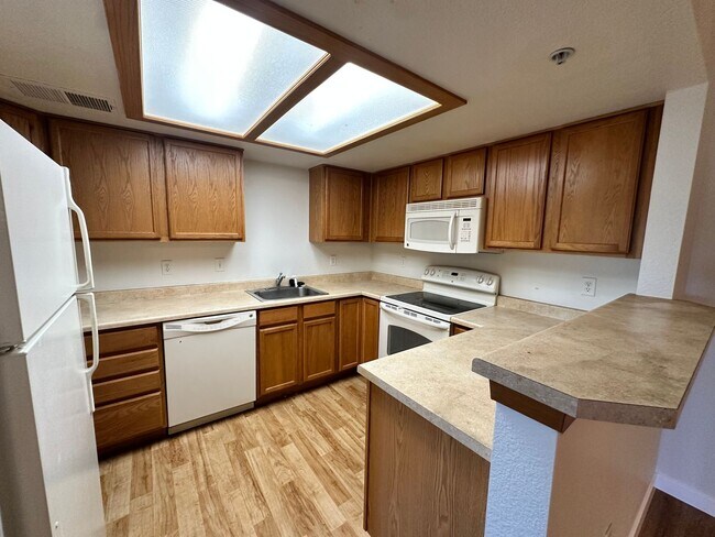 Building Photo - Stylish 3rd Level, Private 2 bedroom Apartment With LVP Flooring, Decks, Gas Fireplace & In-Unit ...