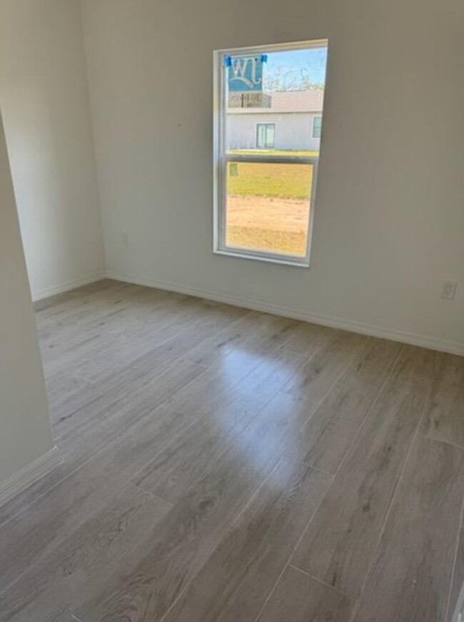 Building Photo - MUST SEE-BRAND NEW THREE BEDROOM, 2 BATH, ...