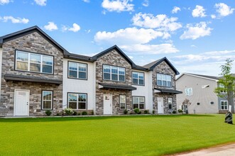 Building Photo - New 3 Bed Townhome with Covered Deck and Oversized Garage!