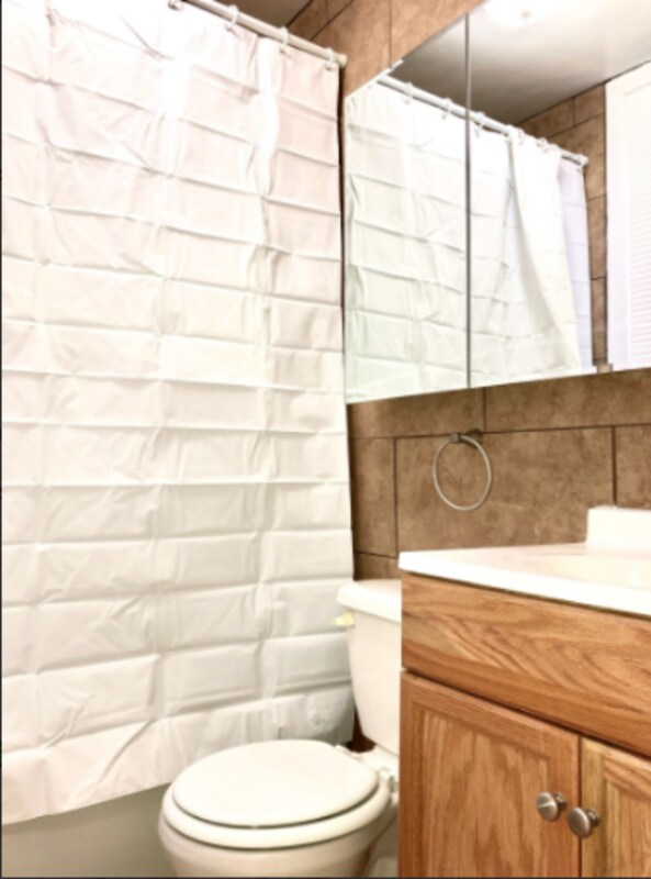 Building Photo - 5001 Tholozan Ave