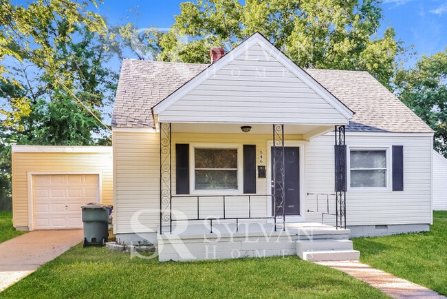 Building Photo - Welcome to this charming abode.