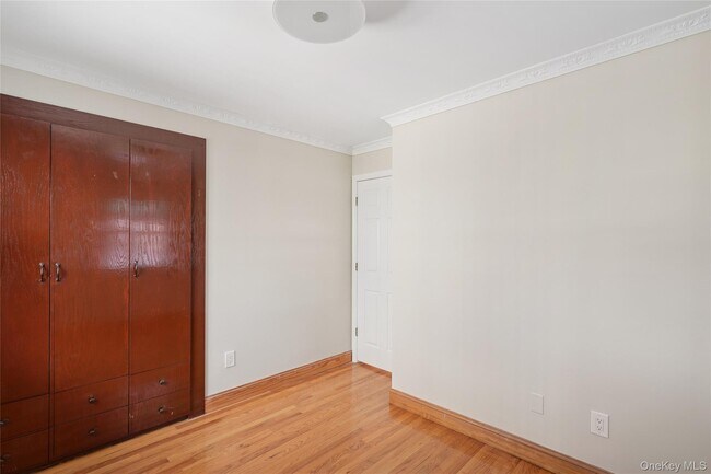 Building Photo - 214-27 38th Ave