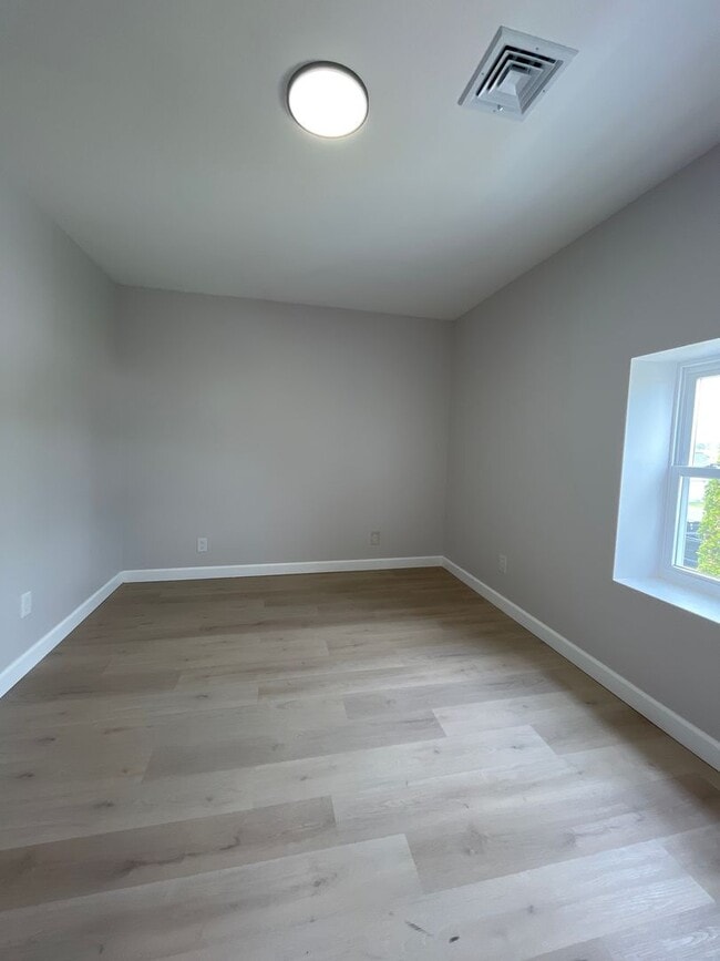 Building Photo - A real stunner! The full renovation is the first thing you'll notice..