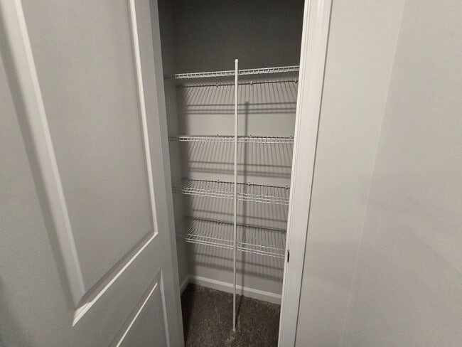 Building Photo - NEWLY BUILT END UNIT TOWNHOME